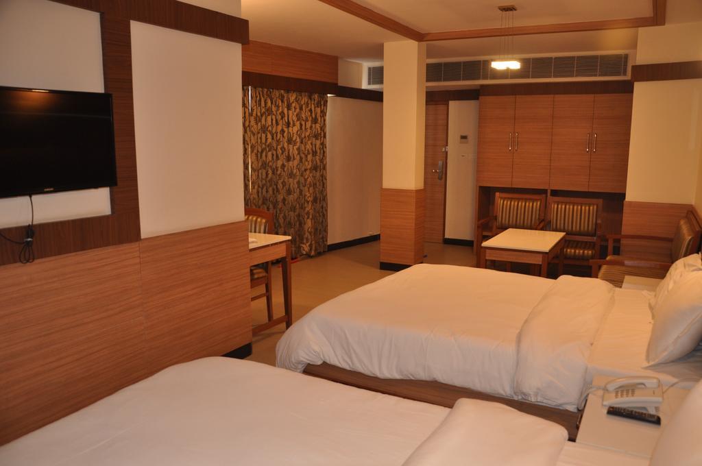 Hotel Sms Grand Inn Vellore Szoba fotó
